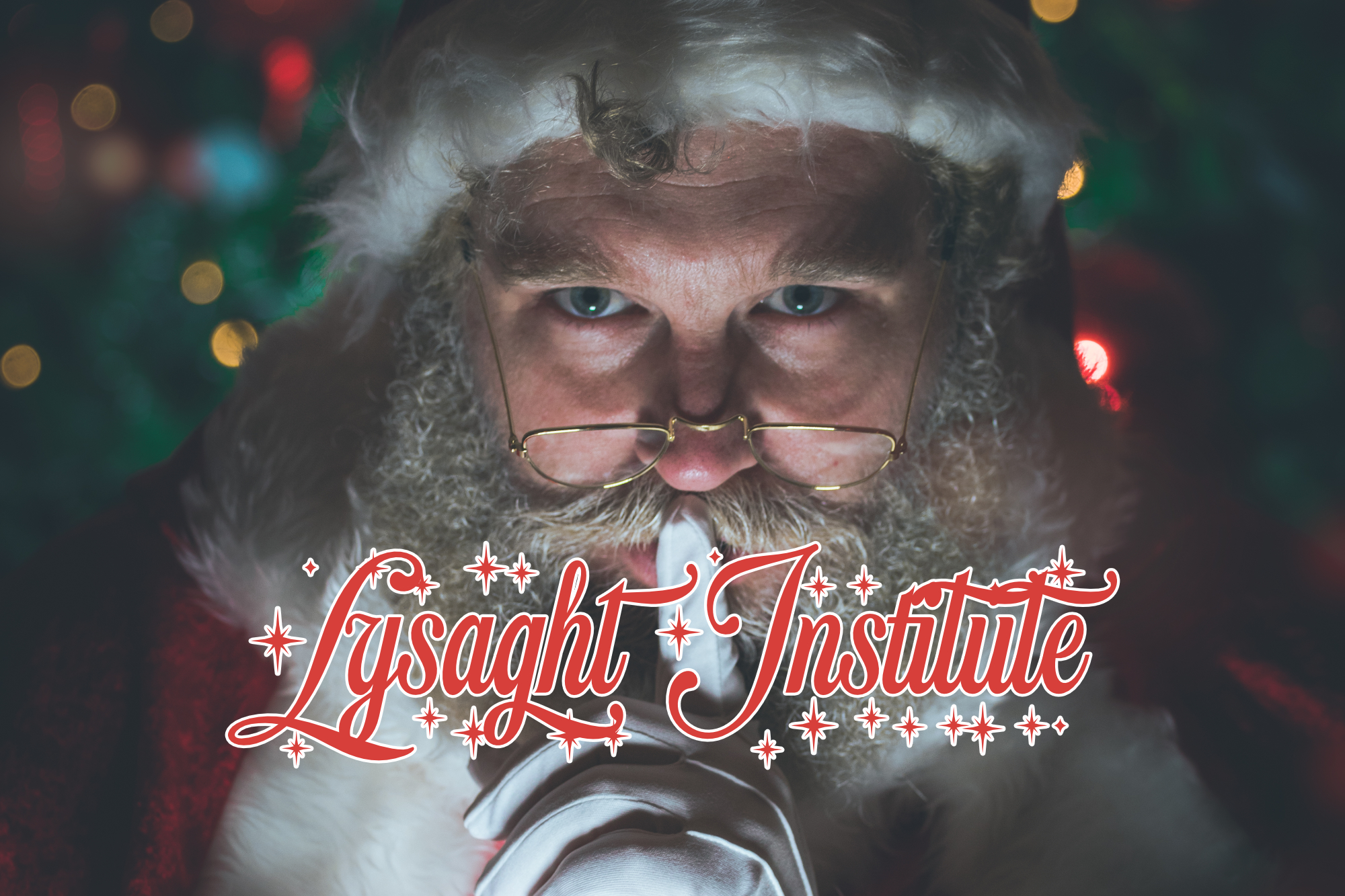 Santa Claus by Mighty Fozzy Entertainment doing a shush pose with the words Lysaght Institute over the top
