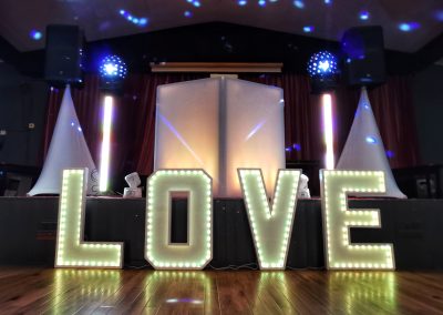 LOVE led lit letters on the dancefloor at Ringland Labour Club Newport in front of Mighty Fozzy Entertainment Disco